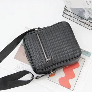 Men's black woven crossbody bag stylish vertical shoulder messenger bag for daily use