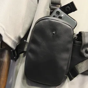 Functional tactical chest bag for men, dark style streetwear wearable techwear multi-pocket pouch.