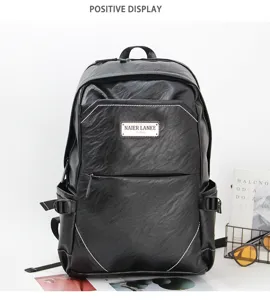 Black leather men business casual backpack detail view with multiple zip pockets and straps.