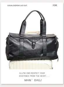Men's travel duffel bag large capacity business trip weekend overnight leather handbag detail.