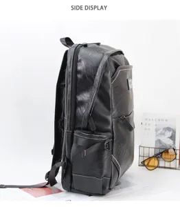 Men business casual black leather waterproof travel backpack large capacity school bag.
