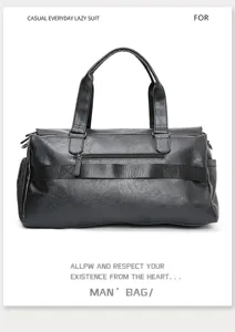 Black men's travel duffel bag with large capacity, durable leather texture and sturdy handles.