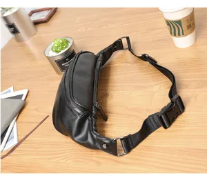 Detailed view of black leather chest bag with zipper pocket, adjustable strap and sturdy buckle.
