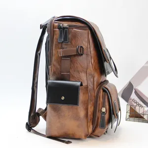 Vintage brown leather backpack for men, large capacity casual travel and computer bookbag.