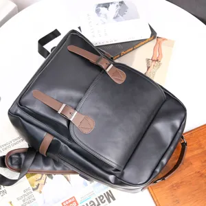 Men's business leather backpack with USB charging port, large capacity travel school bag.