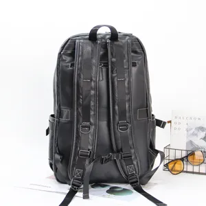 Black leather business backpack for men, large capacity travel computer bag and casual school bag.
