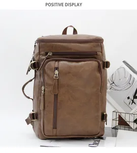Detail view of multi-functional brown PU leather backpack with multiple zipper pockets.
