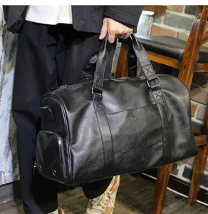 Large capacity business travel duffel bag with shoe compartment, black leather weekend bag.
