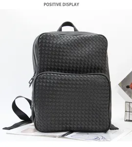 Black woven leather backpack for men and women, fashion business laptop travel bag.