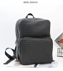 Black woven leather business backpack detail view, large capacity casual travel school bag.