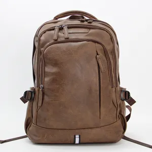 Vintage brown PU leather men's backpack, multi-functional travel school bag and computer bag.