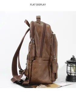 Vintage brown PU leather backpack side view detail with multiple zippers and pockets.