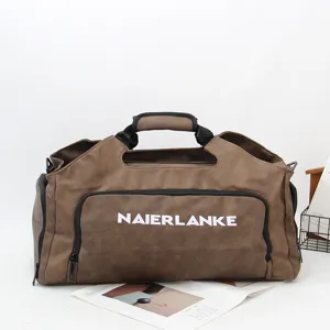 Grand sac de voyage avec compartiment chaussures, sac de sport marron multifonctionnel.