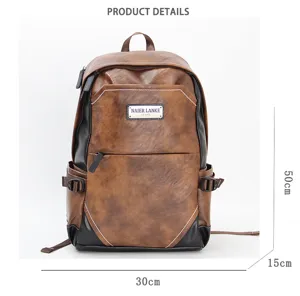 Detail view of vintage PU leather backpack with multiple compartments and size marks.