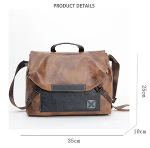 Detailed view of the brown leather messenger bag showing quality stitching and dimensions.