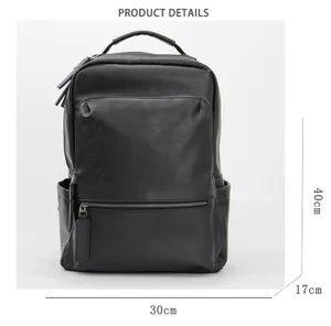 Classic black leather backpack with spacious compartments, durable handle and front zip pocket.