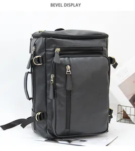 Detailed view of black multi-functional business backpack with multiple zipper pockets and straps.