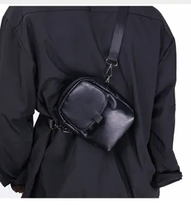 Casual black vertical crossbody phone bag detail view, stylish and versatile for men daily use.