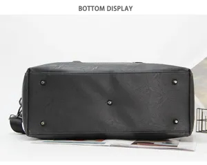 Men black faux leather travel duffel bag bottom display detail showing metal protective feet