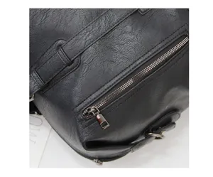Black leather men travel bag detail view, large capacity casual backpack and sports shoulder bag.