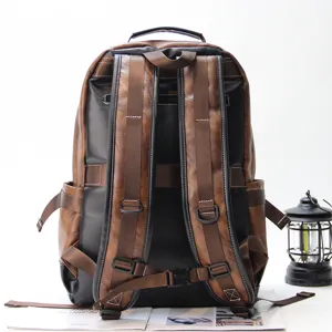 Casual retro waterproof leather backpack for men, vintage outdoor travel school book bag.