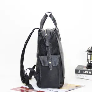 Black leather backpack for men, stylish business laptop bag with multi-functional compartments.