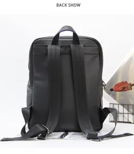 Detailed back view of a minimalist black business backpack, large capacity laptop bag.