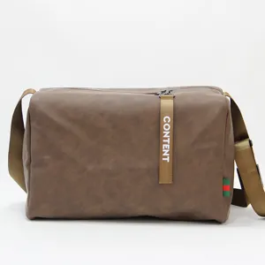 Stylish brown leather messenger bag with spacious interior, ideal for gym, travel and daily commute.