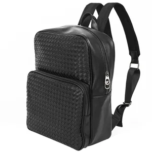 Black woven leather casual business backpack with spacious compartment for stylish travel.