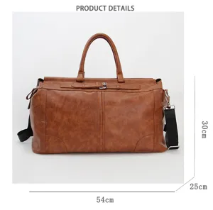 Vue détaillée du sac de voyage vintage marron avec dimensions précises et bandoulière.