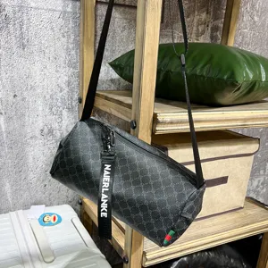 Men cylindrical shoulder crossbody bag trendy vintage monogram streetwear fashion bag detail