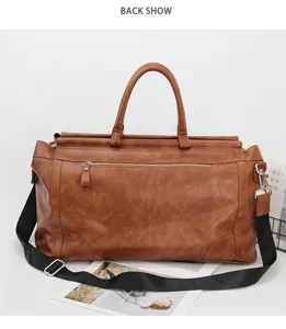 Vue détaillée du sac de voyage rétro marron pour homme, grande capacité épaule et main.