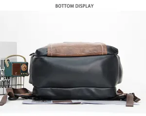 Bottom detail view of vintage men business backpack, black and brown contrast PU leather design.