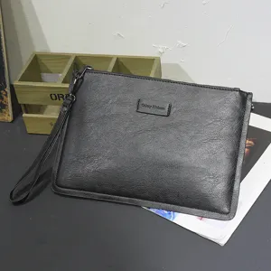 Men's black leather clutch bag large capacity envelope wrist bag with card slots casual style.