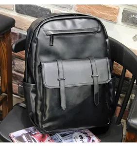 Classic black leather casual backpack with large capacity, ideal for business and travel.