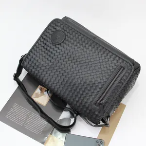Men's black woven leather messenger bag, casual business shoulder crossbody bag for daily use.
