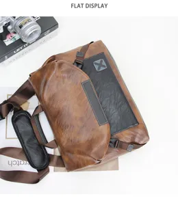 Detailed view of the brown leather messenger bag featuring adjustable strap and buckle closure.