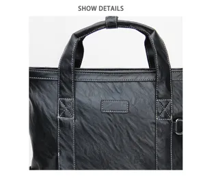 Vue de détail de sac cabas d'affaires noir, texture cuir synthétique avec double poignées.