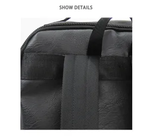 Detailed view of the black leather backpack showing durable straps and zipper design.