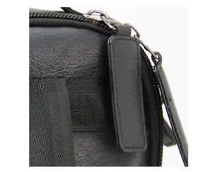 Black leather backpack zipper detail showcasing texture and durable metal hardware for daily use.