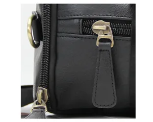 Close-up detail of black leather backpack zipper and hardware, durable daily accessory view.