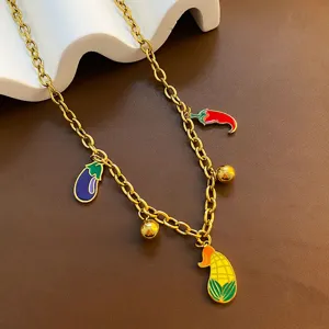 Gold-tone titanium steel chain necklace featuring colorful enamel vegetable charms detail.