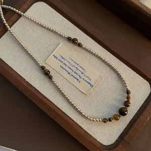 Exquisites Tigerauge Perlenketten Detail, retro Maillard Stil Schlüsselbeinkette für Damen.