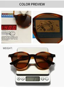 Lunettes de soleil polarisées rondes unisexe avec design écaille classique pour conduite.