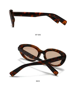 Chic tortoise shell cat-eye sunglasses with brown lenses for stylish street fashion looks.
