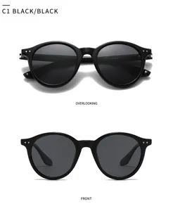 Lunettes de soleil rondes et polarisées classiques pour hommes et femmes en noir élégant.
