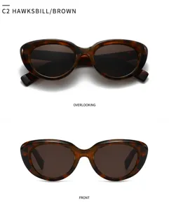 Detail view of stylish cat-eye sunglasses in hawksbill brown, showcasing premium frame texture.