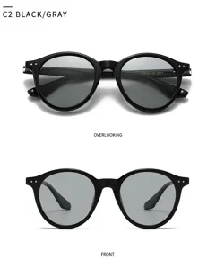 Lunettes de soleil polarisées rondes classiques en noir et gris avec protection UV et vues claires.
