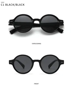 Lunettes de soleil polarisées rondes noires classiques pour hommes et femmes avec protection UV.