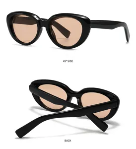 Close-up detail shot of trendy black cat-eye sunglasses with tinted lenses, stylish eyewear.